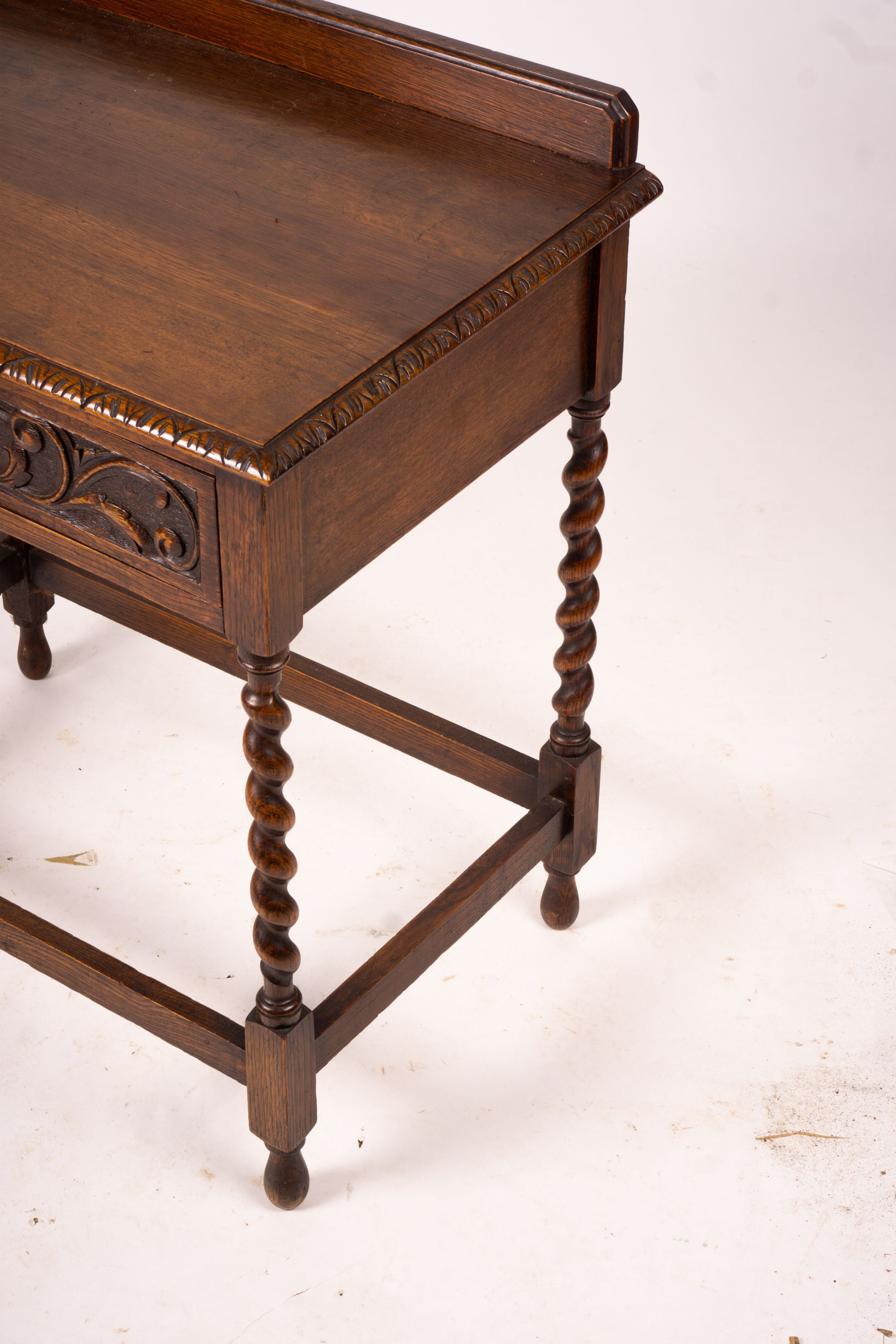 An early 20th century Flemish carved oak side table, W.69cm D.46cm H.77cm